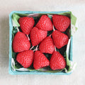 Strawberry Beeswax Birthday Candles, additional view of the realistic strawberry-shaped beeswax candle set by Happy Organics