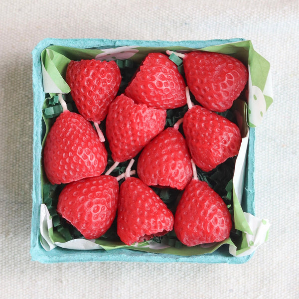 Strawberry Beeswax Birthday Candles, additional view of the realistic strawberry-shaped beeswax candle set by Happy Organics